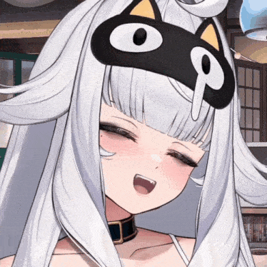 a close up of a girl wearing a mask with a cat face on it