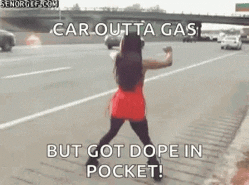 a woman in a red dress is dancing on the side of a highway with a caption .