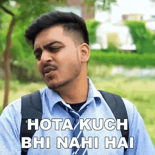 a man in a striped shirt and tie is making a funny face and says " hota kuch bhi nahi hai "