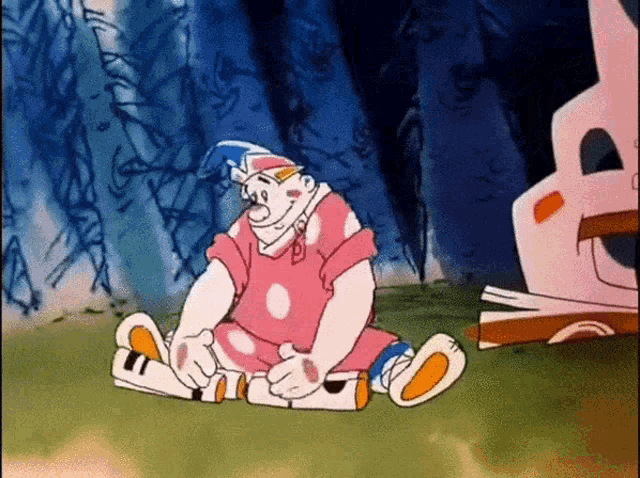 a cartoon character in a pink and white outfit sits on the grass