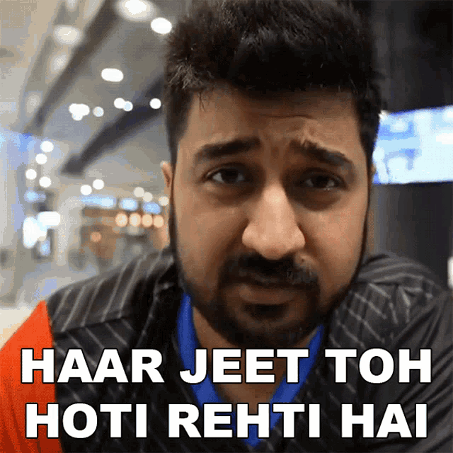 a man with a beard has the words haar jeet toh hoti rehti hai written on his face