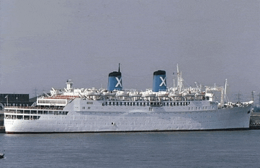 a large white ship with two blue xs on the top