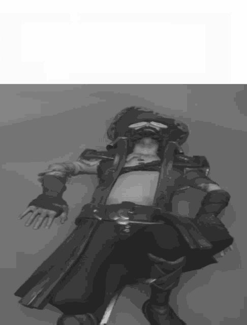 a black and white photo of a pirate laying down
