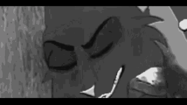 a black and white photo of a cartoon character