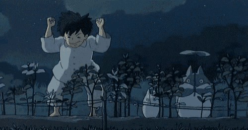 a little girl in a yellow dress is standing in a field with trees at night .