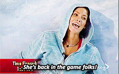 a woman in a hooded jacket says she 's back in the game folks ..