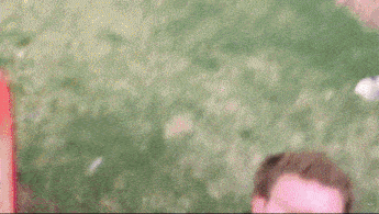 a close up of a man 's face with a blurred background .