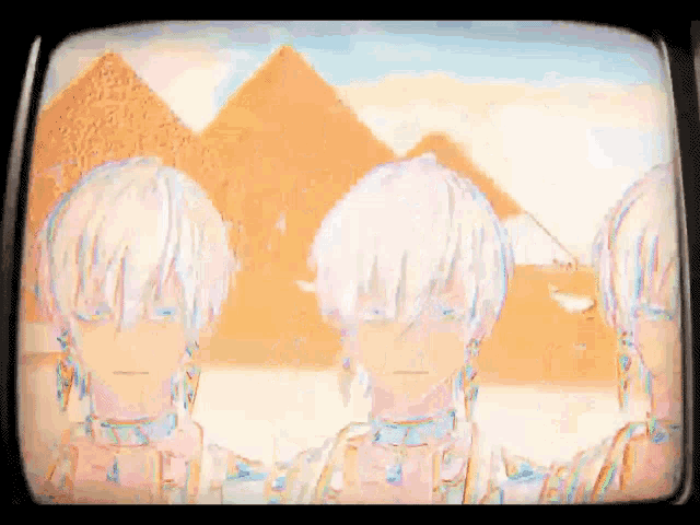 three anime characters are standing in front of a pyramid on a television screen .