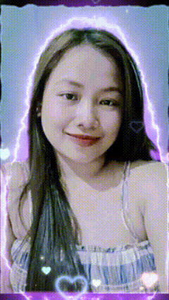a woman with a purple glow around her face
