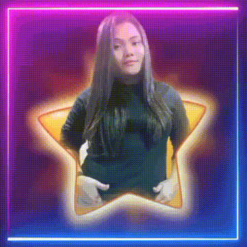 a woman is standing in a star shaped frame with neon lights .