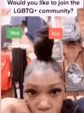 a woman with a bun on her head is asking if she would like to join the lgbtq + community .