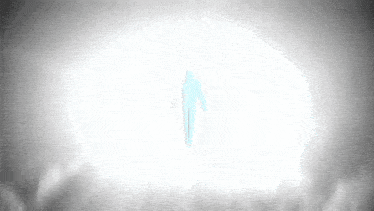 a silhouette of a person standing in front of a light