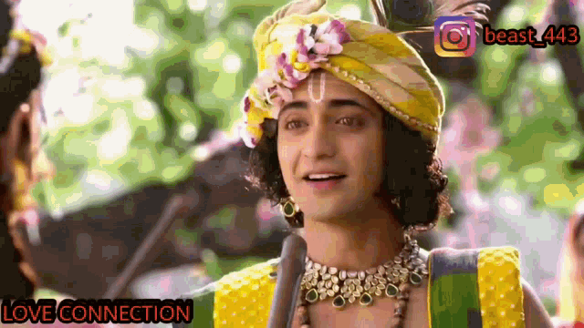 a man wearing a turban and a necklace with the words love connection written below him