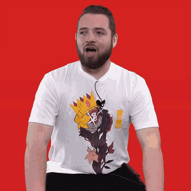 a man with a beard wears a white t-shirt with a picture of a king on it