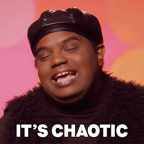 a man with his eyes closed and the words it 's chaotic on the bottom