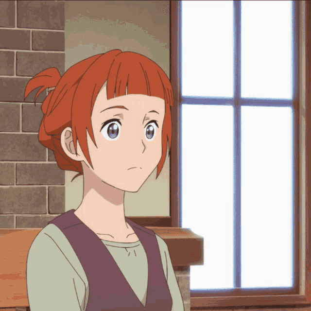 a girl with red hair and blue eyes looks out of a window