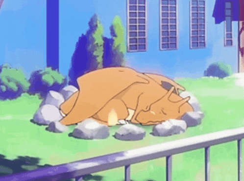 a cartoon character is laying on a pile of rocks in a field .