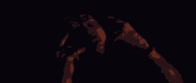 a fire is burning in the dark with smoke coming out of it