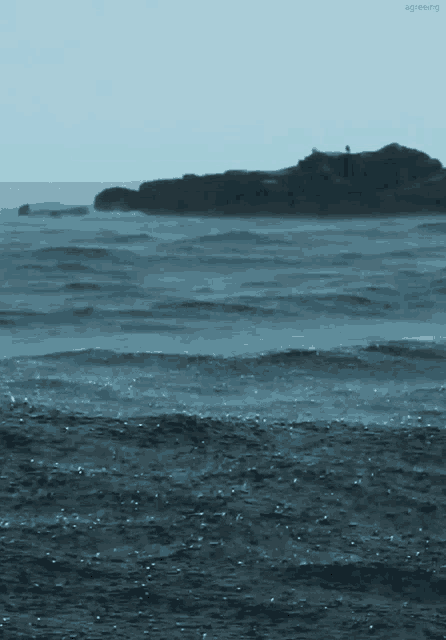 a person standing on a rock in the middle of a body of water with the words skyreaking below them