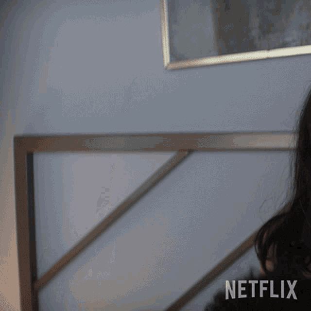 a netflix ad shows a woman looking at herself