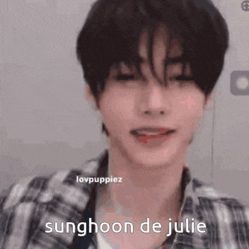 a close up of a person 's face with the words sunghoon de julie written on it .