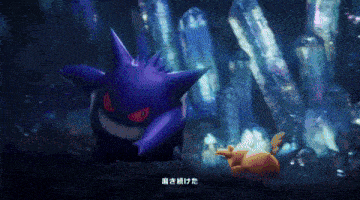 a purple pokemon with red eyes is standing next to a yellow pokemon in a cave