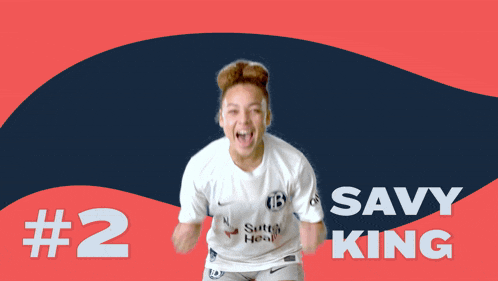 a woman in a soccer jersey with the number 2 on it