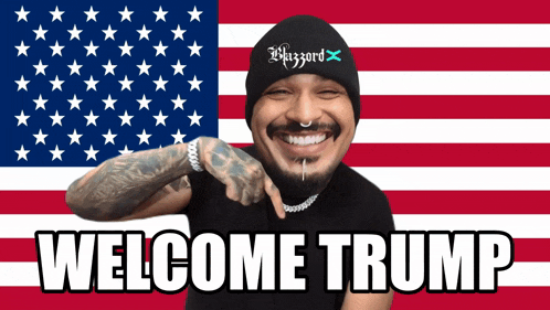 a man in front of an american flag with the words welcome trump on the bottom