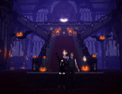 a man and woman are standing in front of a staircase decorated with pumpkins and bats