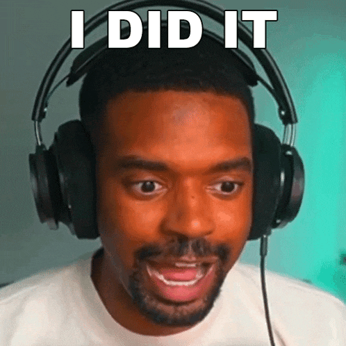 a man wearing headphones with the words i did it written on his face
