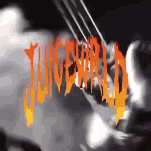 a close up of a person 's face with the word juiceworld written in red