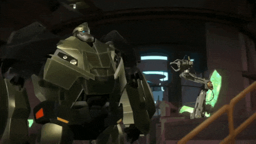 a robot with a green glowing object in its hand