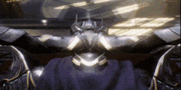 a statue of a knight with a purple cape on his head