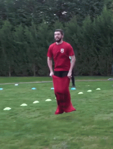 Leaping Hopping GIF - Leaping Hopping Sack Race GIFs