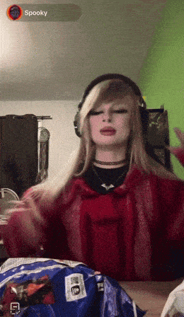 a woman wearing headphones with the word spooky on the corner