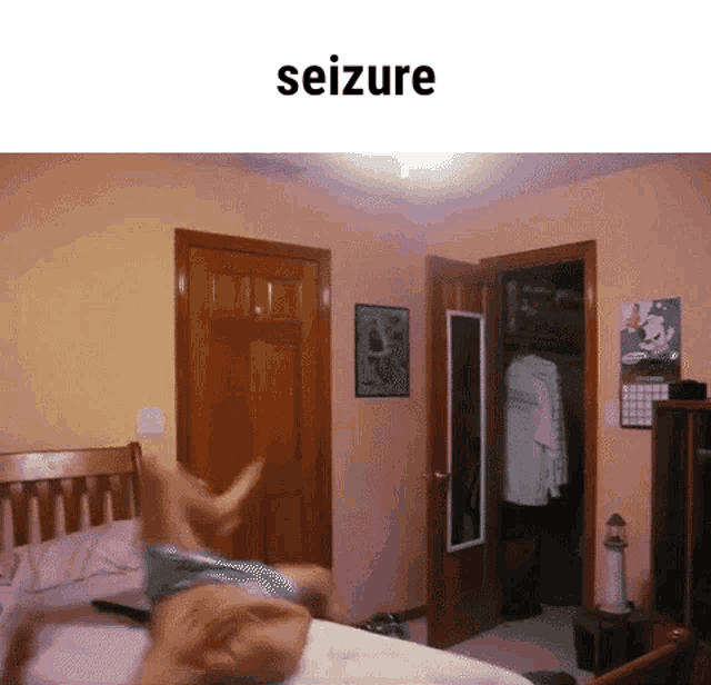 a person is jumping on a bed with the word seizure written above them