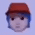 a blurry picture of a person 's face wearing a red hat .