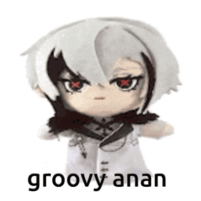 a stuffed animal with a serious face and the words `` groovy anan '' on it .