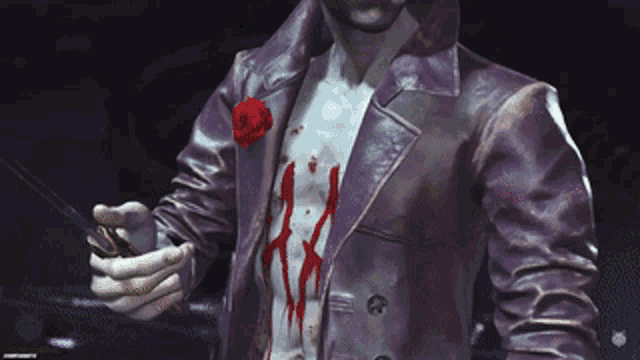 a man in a purple jacket is holding a rose