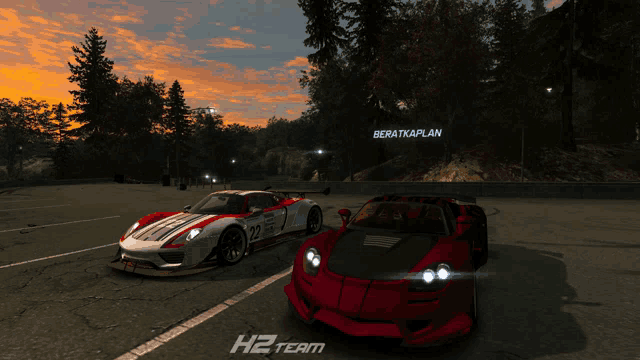 two sports cars are parked on a road with a sign that says ' beratkaplan ' on it
