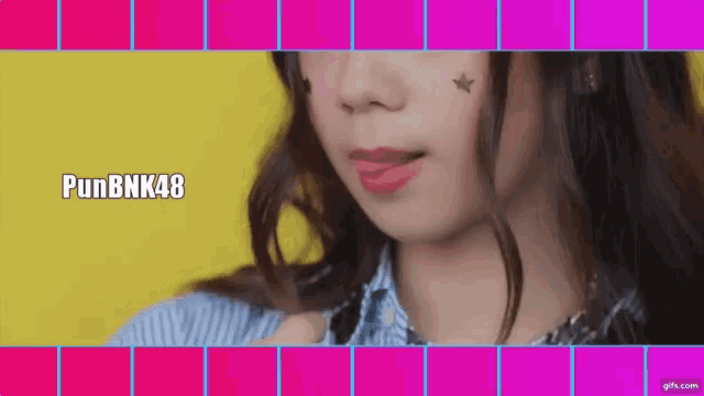 a close up of a woman 's face with punbnk48 written on the bottom right