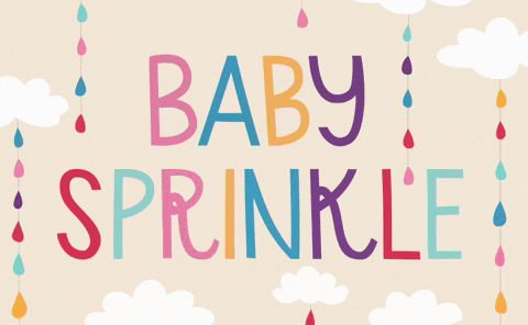 a colorful baby sprinkle sign with rain drops and clouds in the background