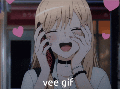 a girl is laughing while talking on a cell phone and the words vee gif are below her