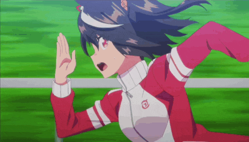 a girl in a red and white tracksuit is running on a track .