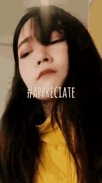 a close up of a woman 's face with the words #appreciate written on it