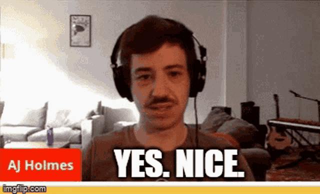 a man wearing headphones says yes nice in front of a camera