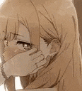 a close up of a brown haired anime girl with her hand on her chin .