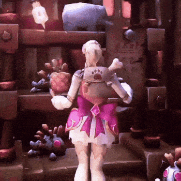 a woman in a pink dress is standing in front of a shelf with a sign that says ' x ' on it