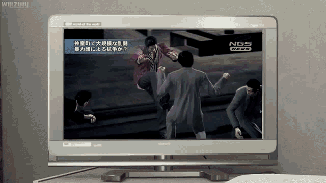a tv screen shows a fighting scene and says ngs need