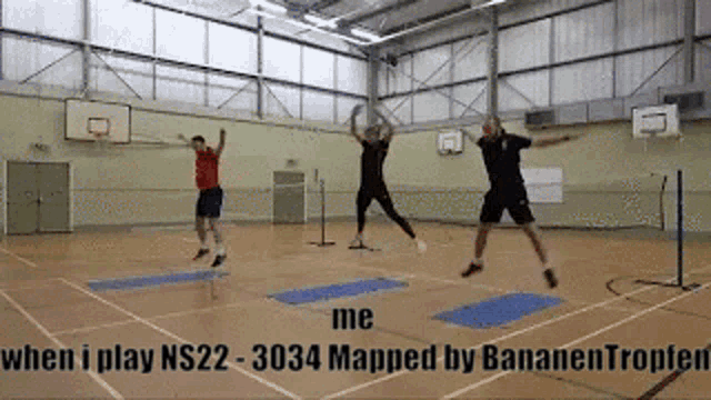 a group of people jumping in the air in a gym with the words me when i play ns22